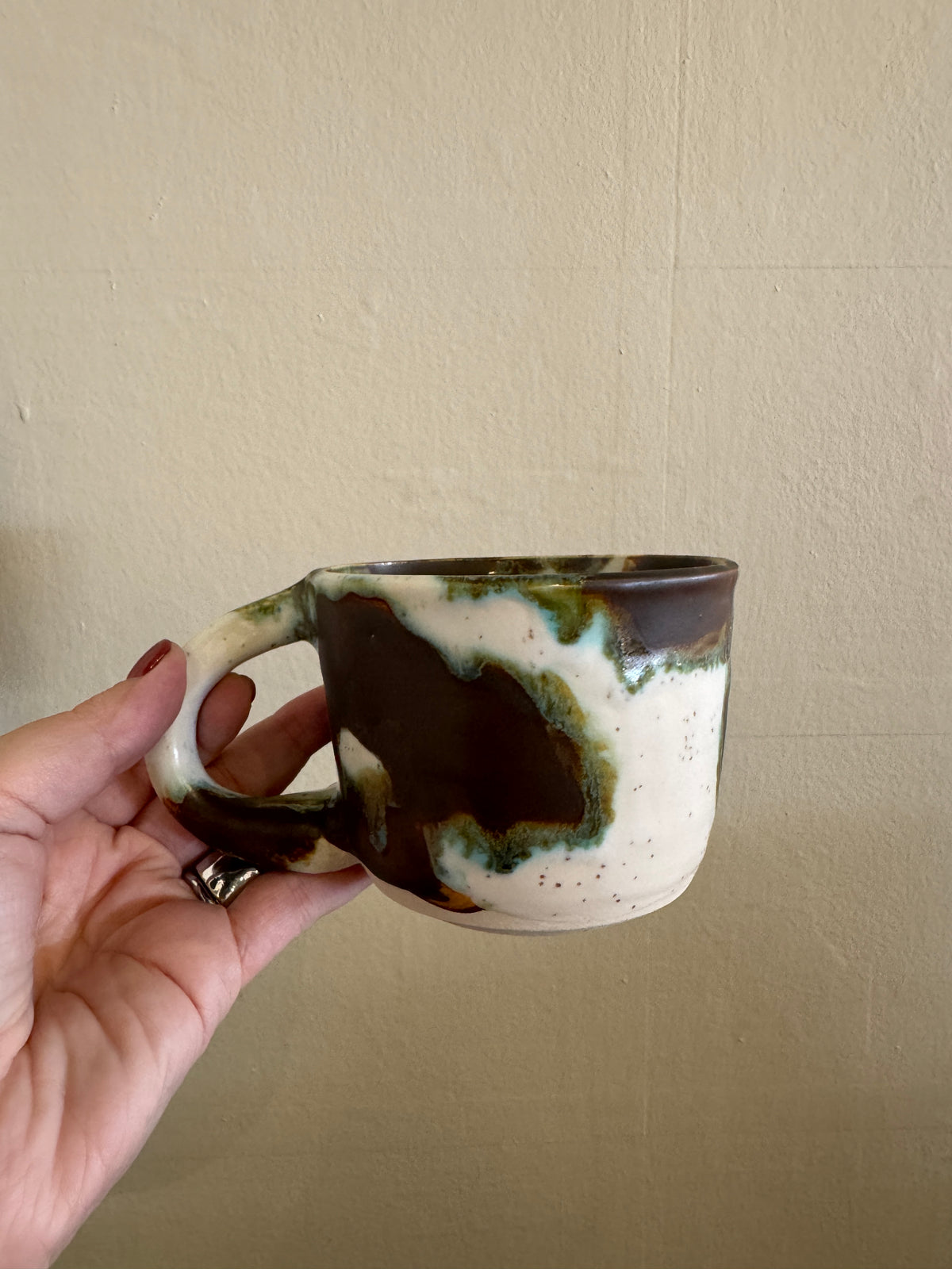 Tiny Potter spotted mug