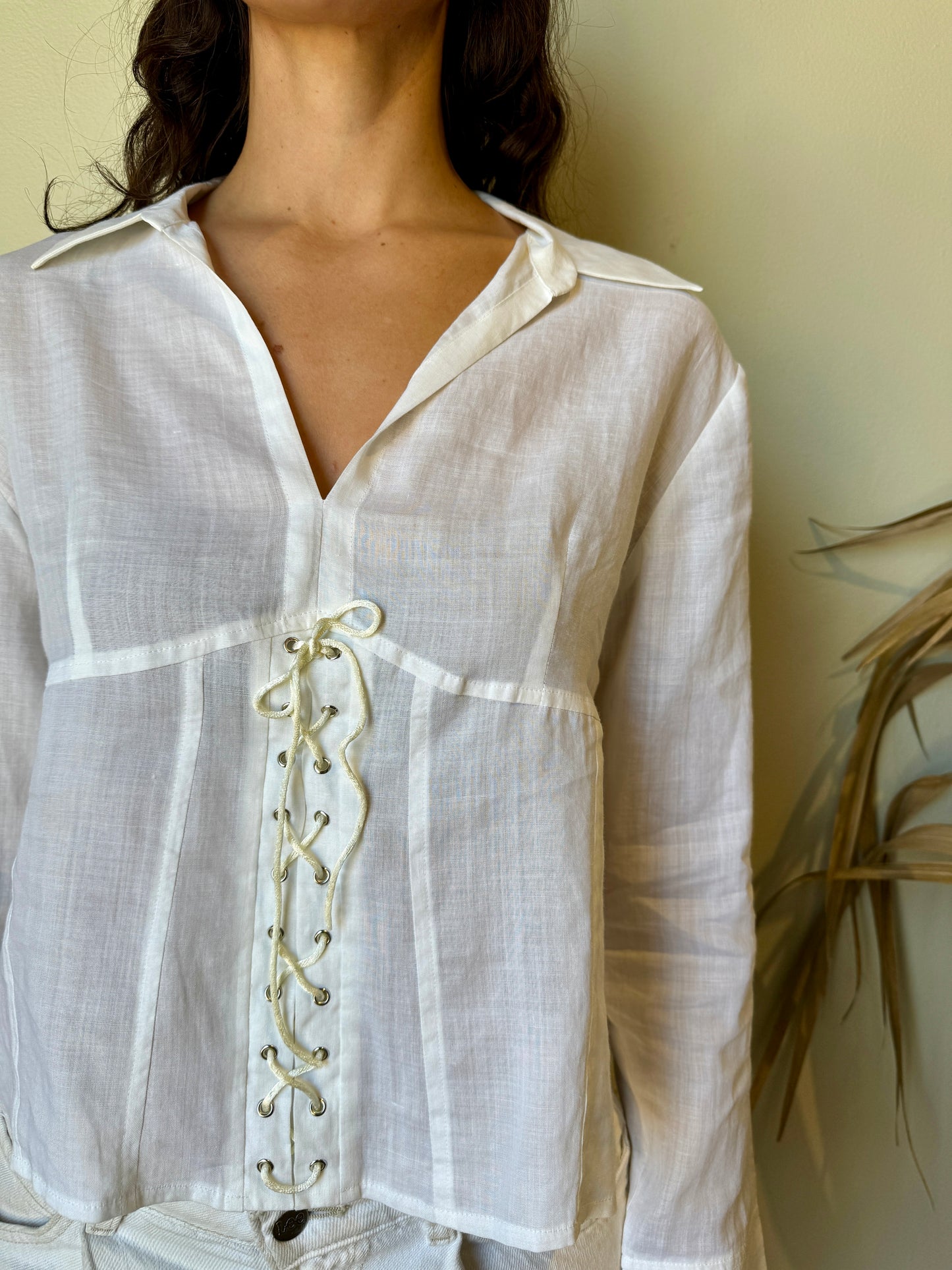 close front shot of white linen corset blouse