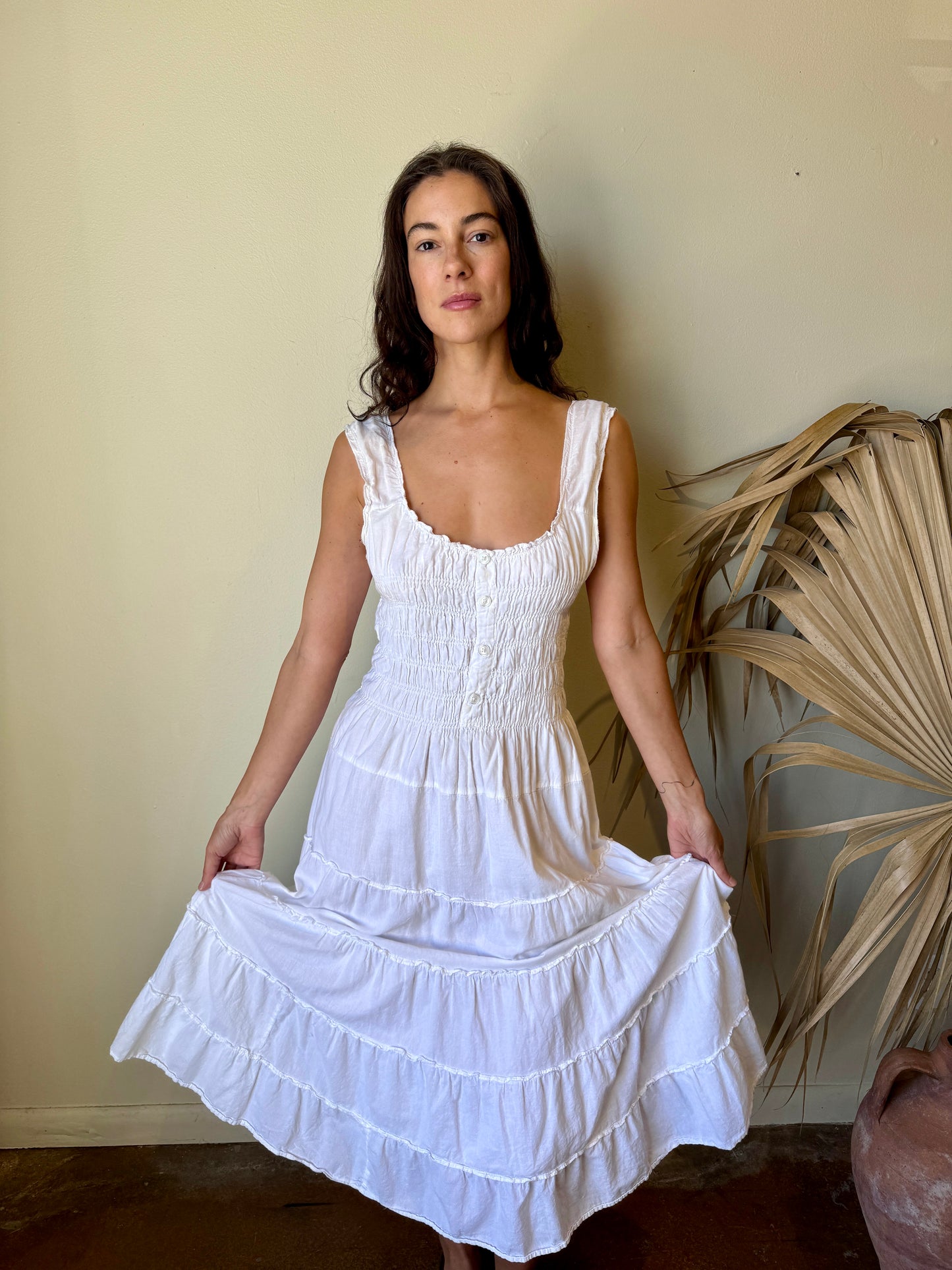 modeled white smocked peasant maxi dress