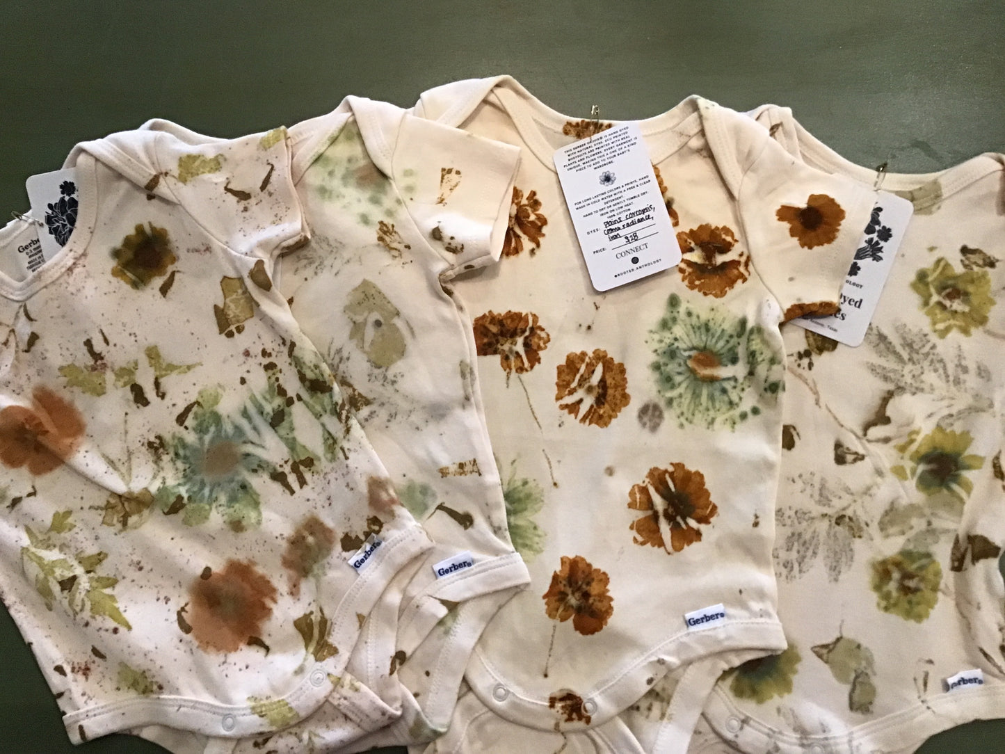 Rooted Anthology Onesies